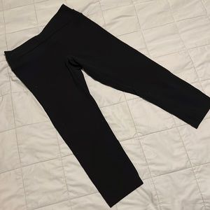 Lululemon black running capri with layered waist band.